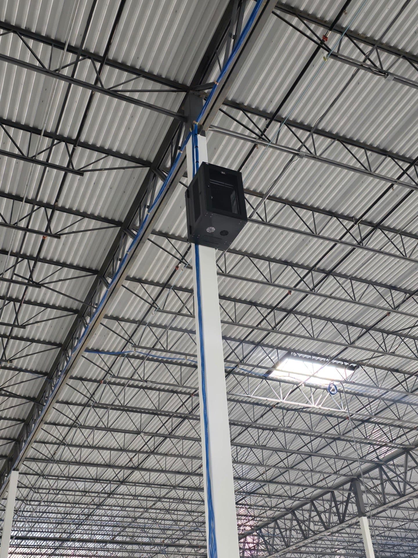 Professional cable routing and management in industrial ceiling infrastructure